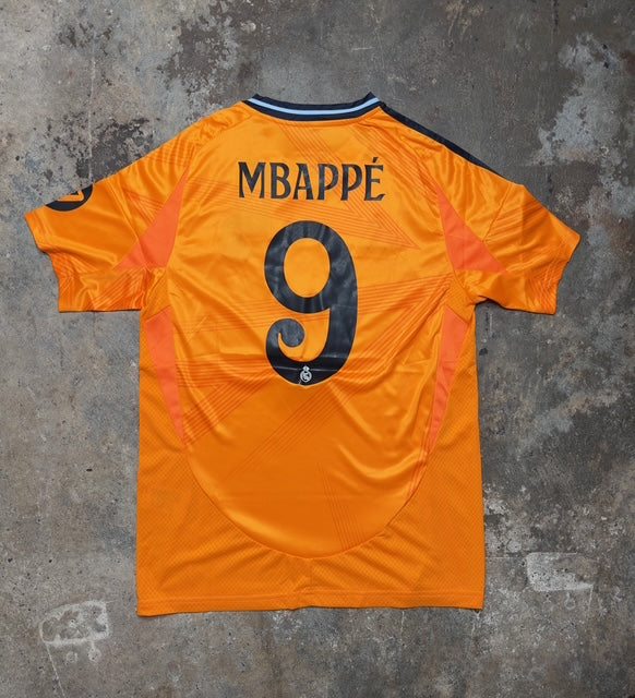 Real Madrid 2024/25 Third Away Jersey Mbappé #9 – Orange Adidas Fan Version Football Shirt | La Liga 24/25 Soccer Kit | Emirates Fly Better