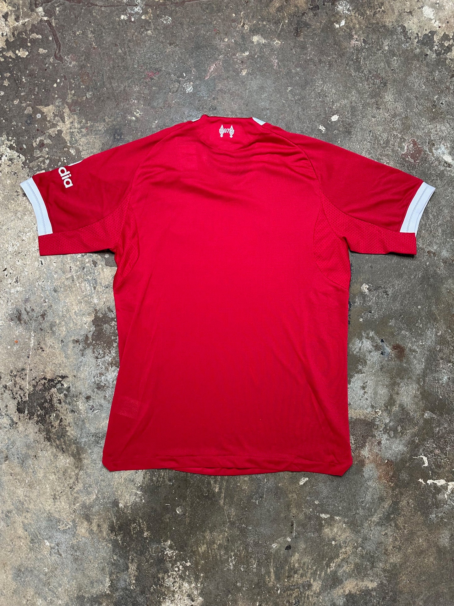 Liverpool 25/26 Home Player Version Jersey – Red – L.F.C. Crest – Standard Chartered Sponsor – 3-Stripes Shoulders